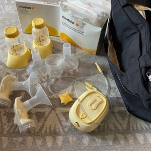 Medela breast pump, double, like new